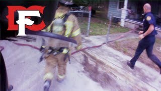 Firefighters Rescue Victim from Burning Home [upl. by Nillad29]